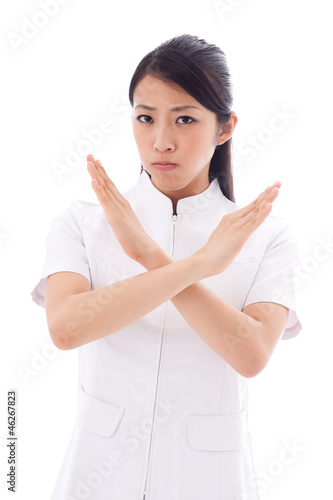 Photo: a young asian doctor on white background a young asian doctor on white background