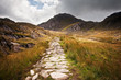 View along footpath in mountains towards Glyder Fawr Snowdonia N