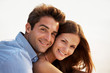 Happy young couple enjoying themselves - Outdoors