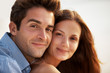 Closeup of young couple sitting together