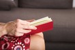 Photo: side red book on brown sofa background side red book on brown sofa background