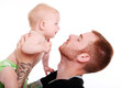 Happy baby in father hands