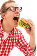 Funny man in glasses eating hamburger