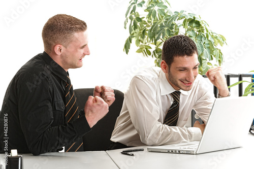 Photo: Erfolgreiche Arbeitskollegen jubeln Erfolgreiche Arbeitskollegen jubeln