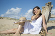 Photo: Sitting on the beach Sitting on the beach