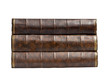 Three antique books stacked on their side