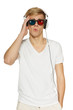 Photo: Disappointed man in three-dimensional glasses and headphones Disappointed man in three-dimensional glasses and headphones