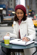 Woman Jotting Down Notes