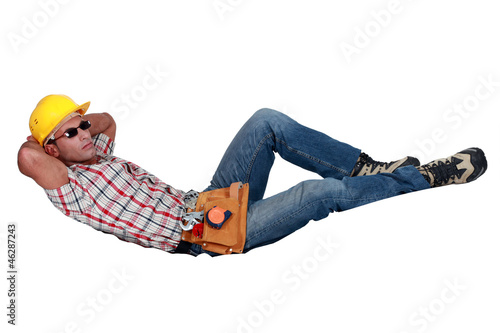 Photo: Construction worker lazing about Construction worker lazing about