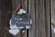 Steintafel mit "Frohe Weihnachten" Text