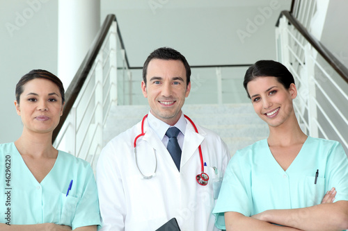 Photo: Portrait of two female nurses with doctor Portrait of two female nurses with doctor