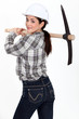 Woman carrying pick-axe