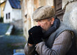 Photo: Homeless man in the street is being cold Homeless man in the street is being cold