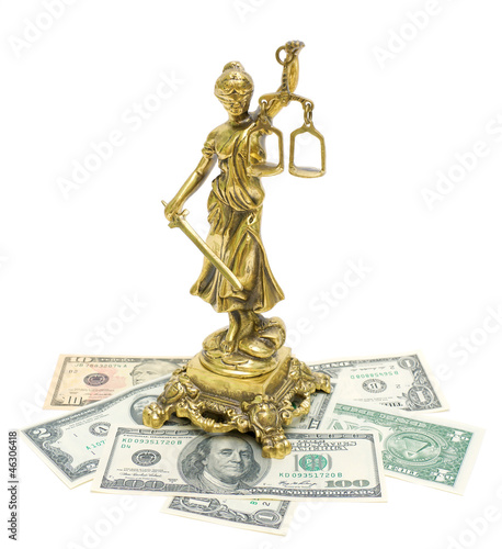 Photo: statue of justice and money isolated on white background statue of justice and money isolated on white background