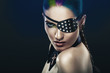 cute woman with coloured hair and eye-patch