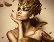 sexy woman in feather gold hat