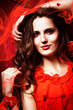 woman in red dress around fabric