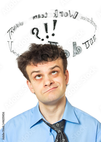 Photo: A portrait of a young comic businessman lost in thoughts - searc A portrait of a young comic businessman lost in thoughts - searc