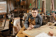 Photo: Craftsman in workshop Craftsman in workshop