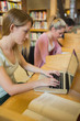 Woman at study desk using laptop