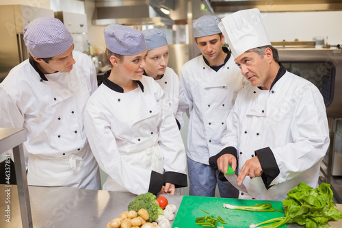 Photo: Trainees learning vegetable slicing Trainees learning vegetable slicing