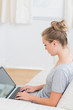 Photo: Blonde typing on the notebook Blonde typing on the notebook
