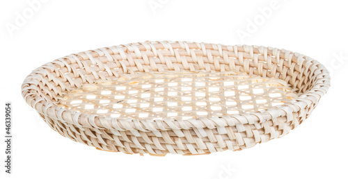 Photo: Wickerwork empty yellow breadbasket on white background Wickerwork empty yellow breadbasket on white background