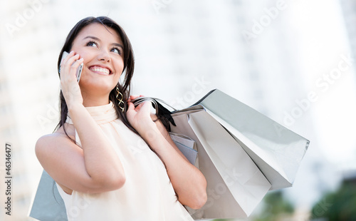 Photo: Shopping woman on the phone Shopping woman on the phone