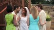 Vidéo : Smiling bride and groom toasting and drinking champagne with friends at wedding reception Smiling bride and groom toasting and drinking champagne with friends at wedding reception