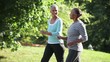 Mature Black women walking briskly in neighborhood