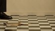 A man steps on banana peel and falling (slow motion)