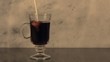 Cream pouring into coffee (slow motion)