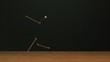Nails falling onto board (slow motion)