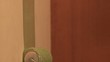 Paint is applied to wall with paint roller (slow motion)