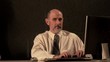 Caucasian businessman gets pie in the face (slow motion)