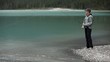 Caucasian woman fishing on a mountain lake