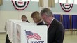 People voting at voting booths