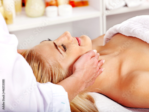 Photo: Woman getting facial massage . Woman getting facial massage .