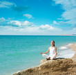 Woman Doing Yoga near the Sea