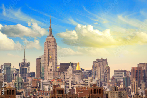 Photo: Manhattan Skyscrapers with Cloudy Sky, New York City Manhattan Skyscrapers with Cloudy Sky, New York City