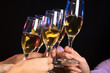 Champagne glasses during toast