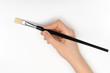 Hand with a brush