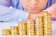 A Businessman rising coins