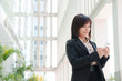 asian business girl using phone