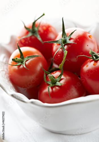Photo: Close up of cherry tomatoes in a bowl Close up of cherry tomatoes in a bowl