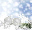 Christmas branch of tree ribbon bauble snow on blue background