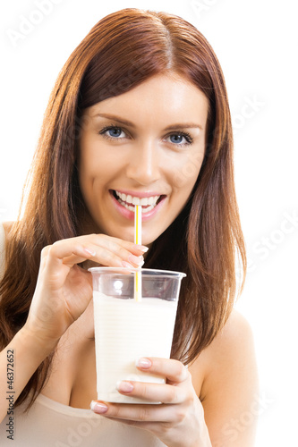 Photo: Beautiful woman drinking milk, over white Beautiful woman drinking milk, over white
