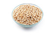 Oats in transparent bowl isolated on white