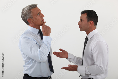 Photo: Businessmen in discussion Businessmen in discussion