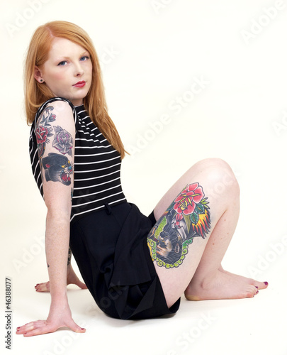 Photo: Strawberry Blonde Sat Down Leaning Back on her Arms Isolated Strawberry Blonde Sat Down Leaning Back on her Arms Isolated